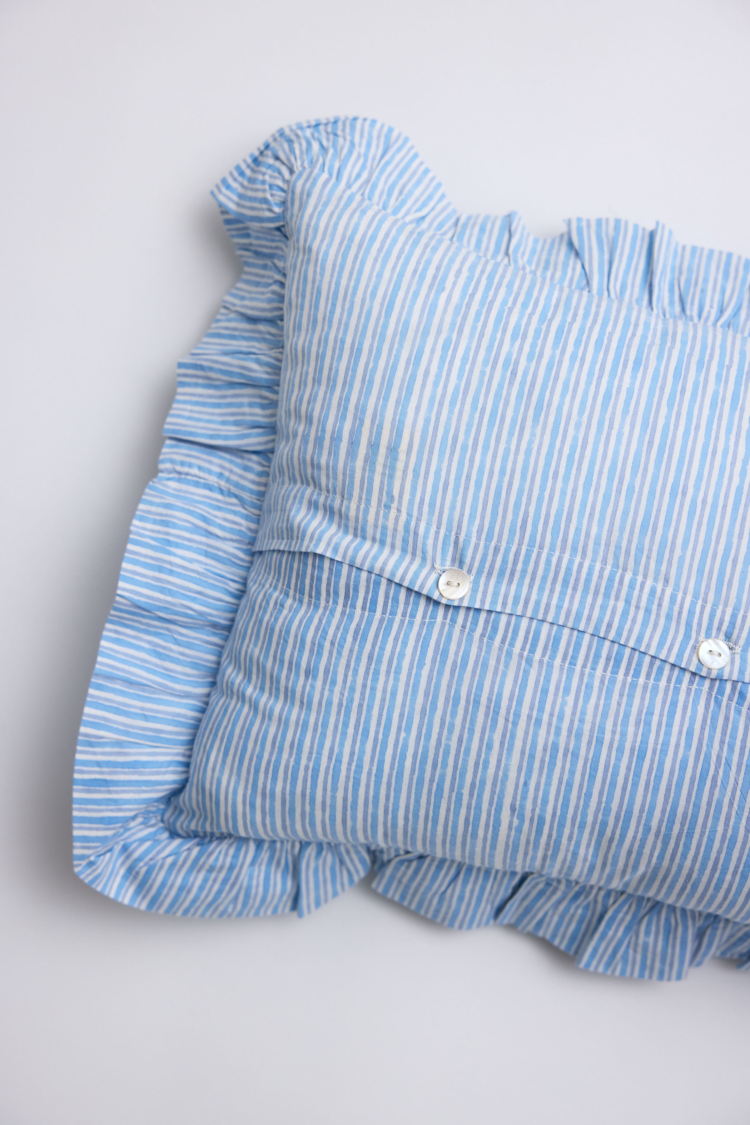 Gardenia Rectangular Throw Pillow with Blue Striped Ruffles